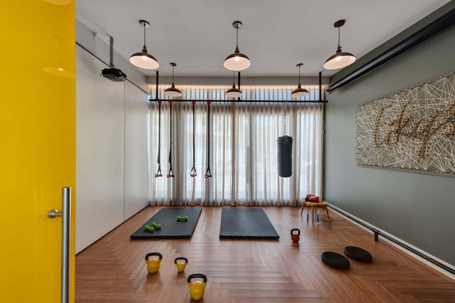Adjustable drapes in a Tel Aviv Studio, creating a private and intimate workout space