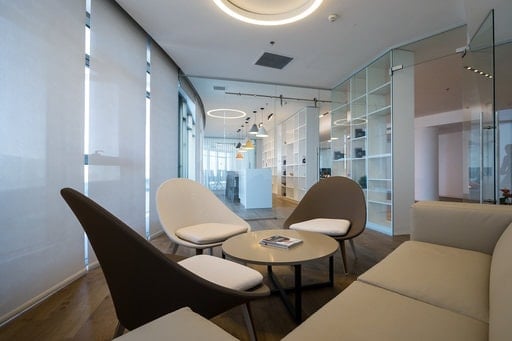 French rolling mesh, a great solution for shading an office area, while keeping a modern vibe
